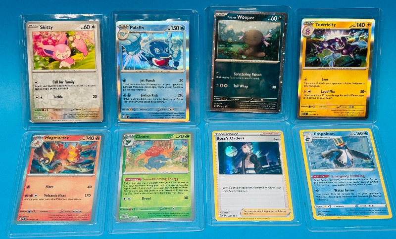 Photo 1 of 699463…8 reverse and holo Pokémon cards in hard plastic sleeves 