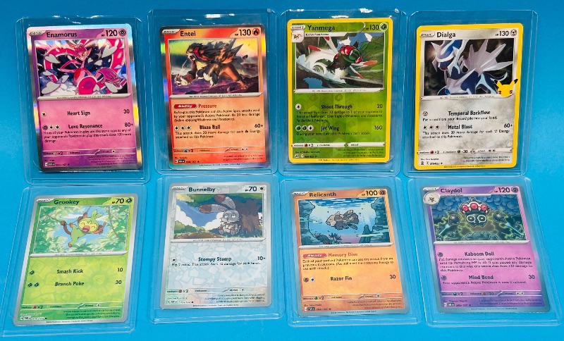 Photo 1 of 699465… 8 reverse and holo Pokémon cards in hard plastic sleeves 