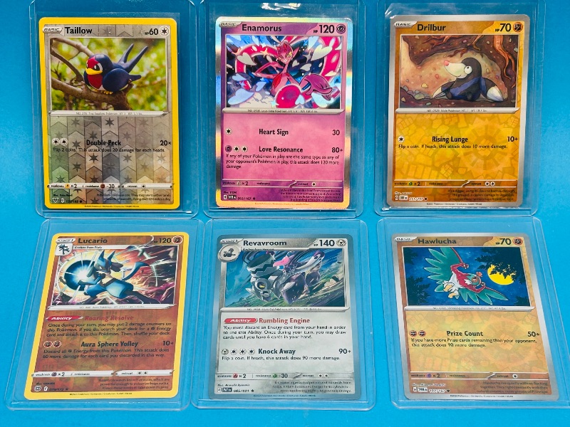 Photo 1 of 699467… 6 reverse and holo Pokémon cards in hard plastic sleeves 