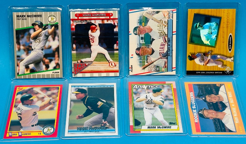 Photo 1 of 699483…8 Mark McGwire cards in hard plastic sleeves 