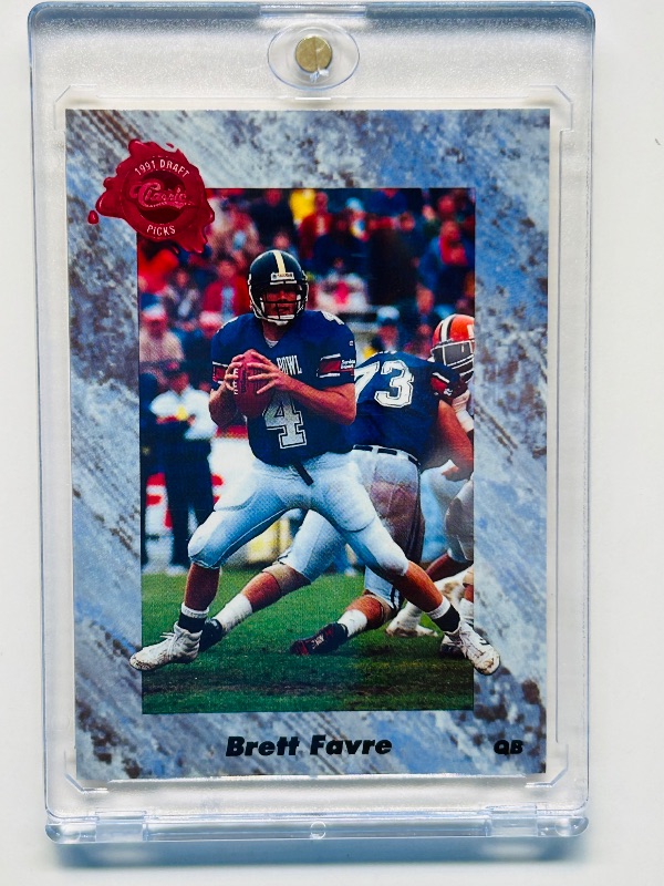 Photo 1 of 699502…Rookie Brett Favre card 129 in hard plastic case 