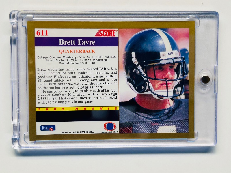 Photo 2 of 699504…Rookie Brett Favre card 611 in hard plastic case 