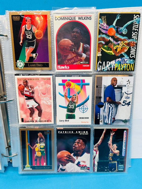 Photo 1 of 699524… final sale no returns/refunds- 351 mixed basketball cards in binder