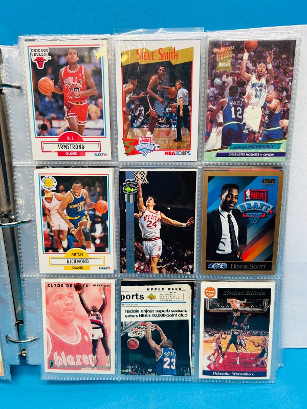 Photo 2 of 699524… final sale no returns/refunds- 351 mixed basketball cards in binder