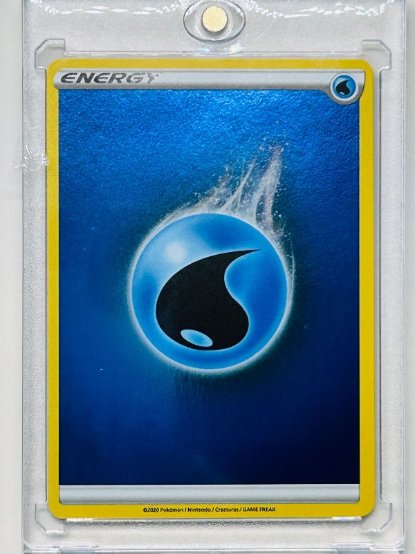 Photo 1 of 699544… Pokémon holo foil energy card in hard plastic case