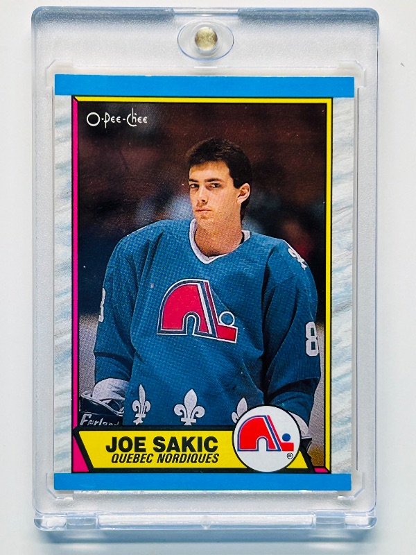 Photo 1 of 699553…Rookie Joe Sakic card 113  in hard plastic case