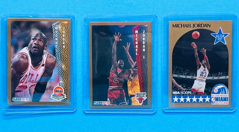 Photo 1 of 699566…3 Michael Jordan cards in hard plastic sleeves 