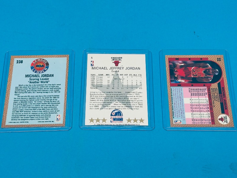 Photo 2 of 699568…3 Michael Jordan cards in hard plastic sleeves 