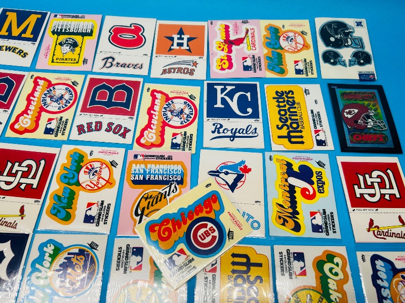 Photo 6 of 699617…vintage Fleer sports stickers in plastic sleeves 