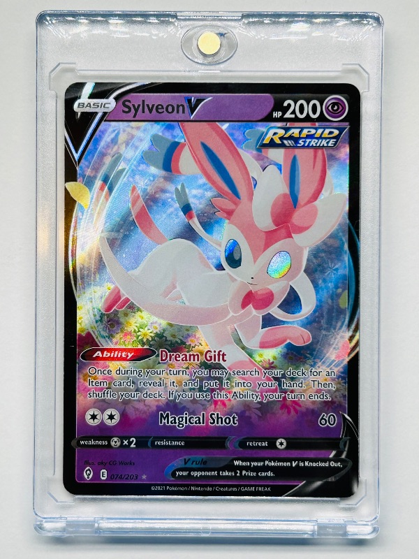 Photo 1 of 698665…Pokémon V holo card 074/203  in hard plastic case 