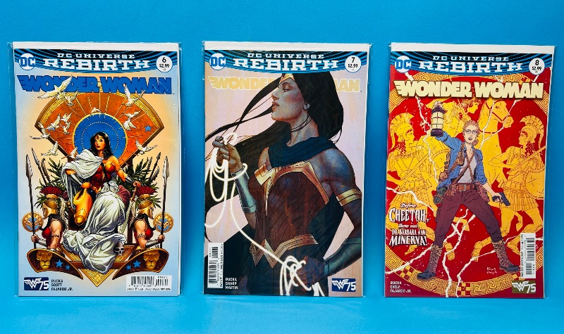 Photo 1 of 699701…3 Wonder Woman comics in plastic sleeves #6,7,8