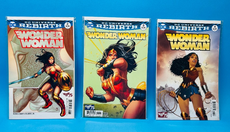 Photo 1 of 699702… 3 Wonder Woman comics in plastic sleeves #2,3,4