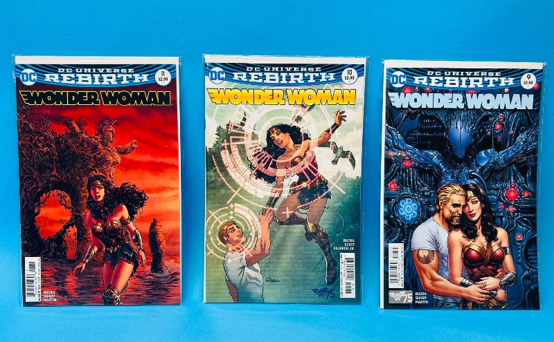 Photo 1 of 699703…3 Wonder Woman comics in plastic sleeves #9,10,11