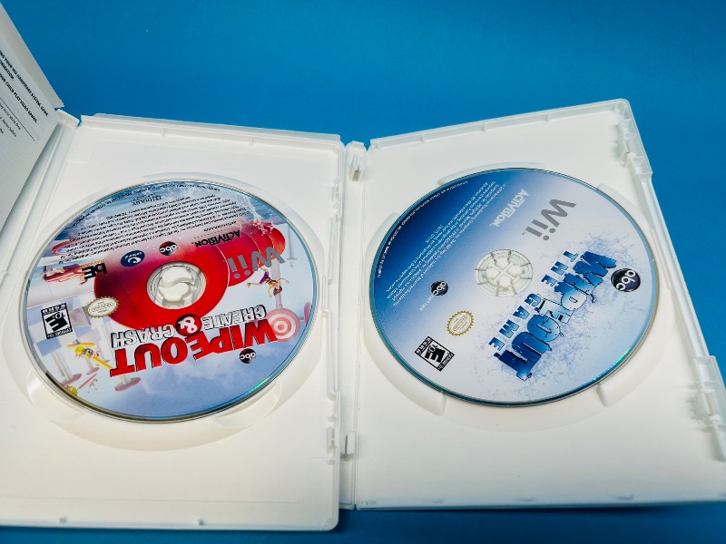 Photo 2 of 699709…2 Wii game discs