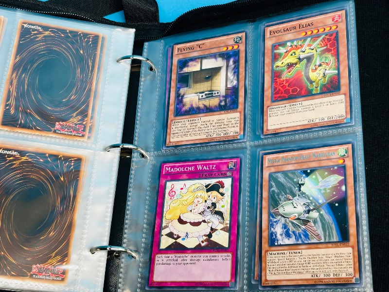 Photo 5 of 699739…final sale no returns/refunds -108 mixed Yu-Gi-Oh! Cards in binder