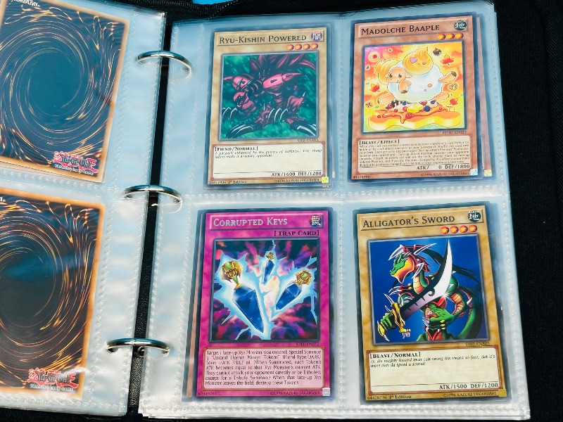 Photo 22 of 699739…final sale no returns/refunds -108 mixed Yu-Gi-Oh! Cards in binder