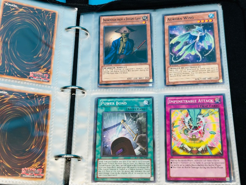 Photo 9 of 699739…final sale no returns/refunds -108 mixed Yu-Gi-Oh! Cards in binder