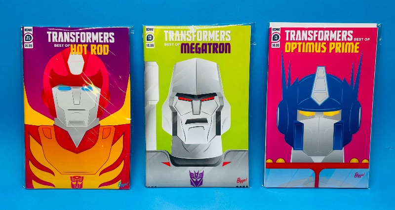 Photo 1 of 699741…  3 transformers comics in plastic sleeves 