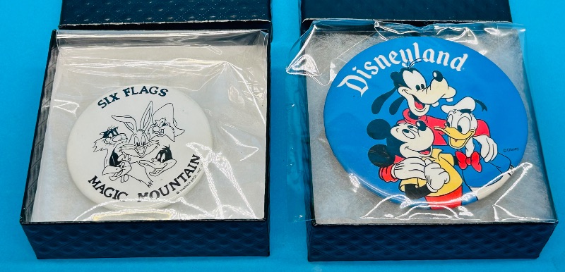 Photo 1 of 699837…2 vintage amusement park pins in gift boxes- Disneyland and Magic Mountain- shows wear from age