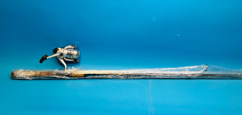 Photo 1 of 699874…Daiwa reel and fishing rod