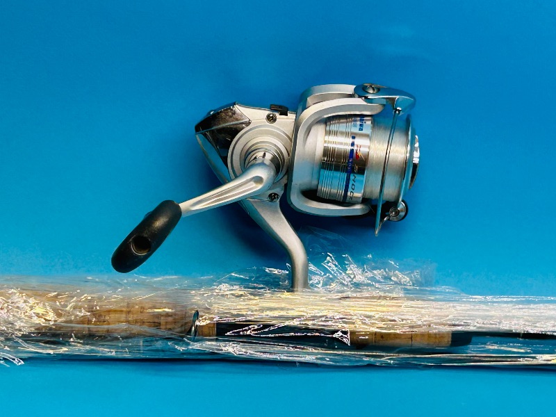 Photo 1 of 699874…Daiwa reel and fishing rod