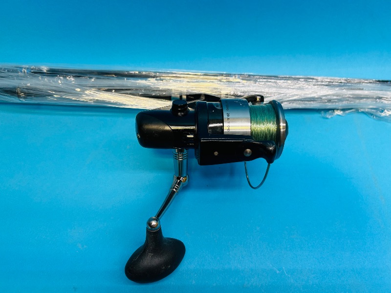 Photo 1 of 699876…heavy duty fishing reel and rod