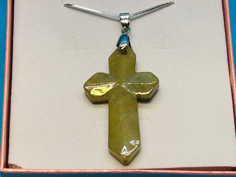 Photo 1 of 699902… polished rock cross pendant on 20” chain in gift box