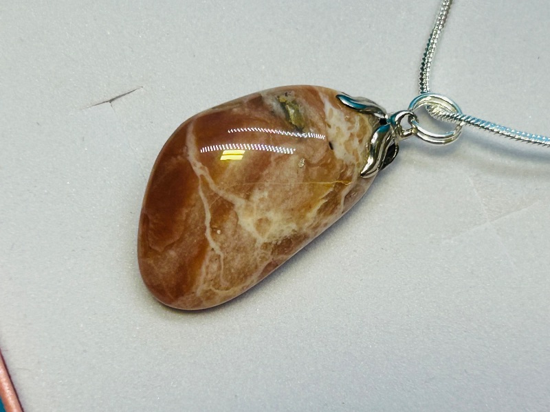 Photo 1 of 699905…2 polished rock  pendants on 18” chains in gift boxes 