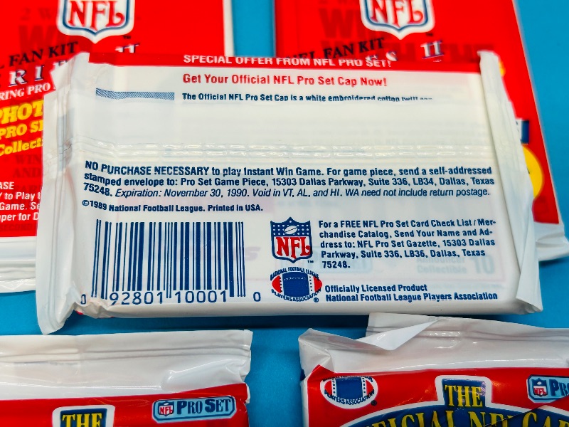Photo 1 of 699906…final sale no returns/refunds-8 sealed NFL fan kit card packs