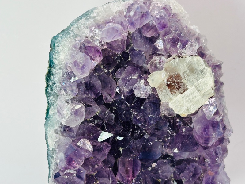 Photo 1 of 699935… 6”  amethyst crystal rock on display stand-height includes stand