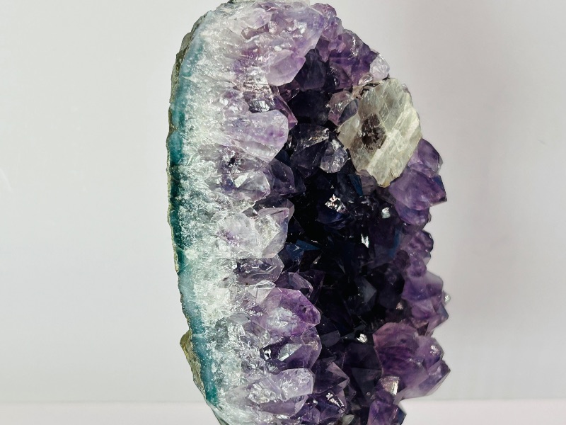 Photo 1 of 699935… 6”  amethyst crystal rock on display stand-height includes stand