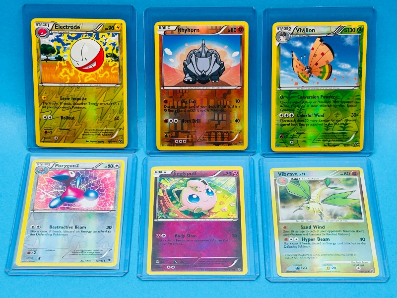Photo 1 of 699950…6 Pokémon reverse holo cards in hard plastic sleeves 