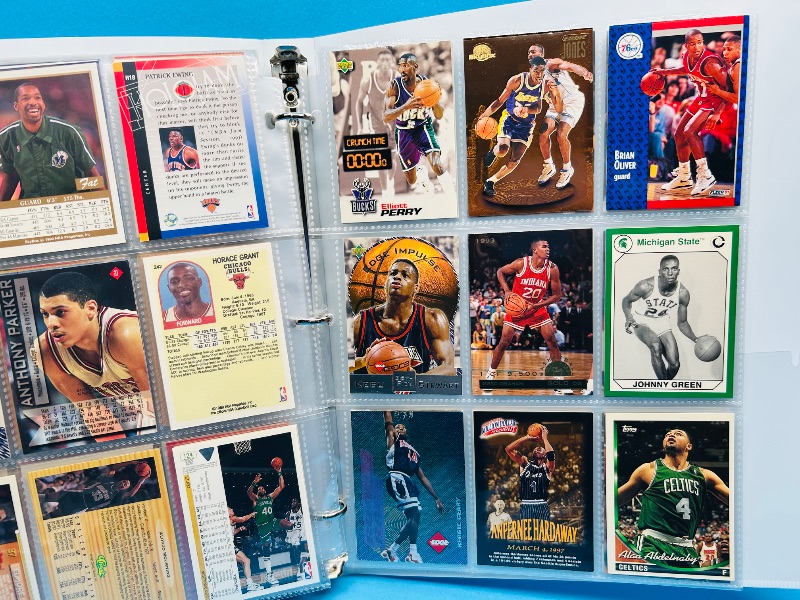 Photo 1 of 699965…final sale no returns/refunds- 180 mixed basketball cards in binder 