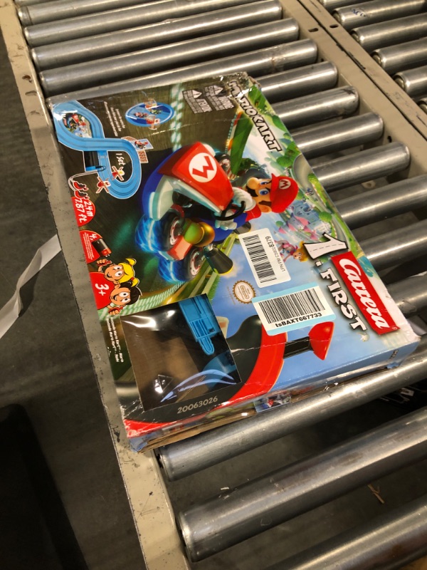 Photo 2 of Carrera First Mario Kart - Slot Car Race Track With Spinners - Includes 2 Cars: Mario and Yoshi - Battery-Powered Beginner Racing Set for Kids Ages 3 Years and Up Mario Kart w/ Spinners