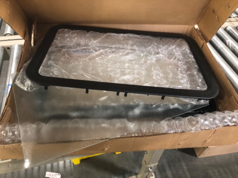 Photo 1 of Lippert Components 363370 Black 12" x 21" Inner and Outer Entry Door Window Frame with Seal