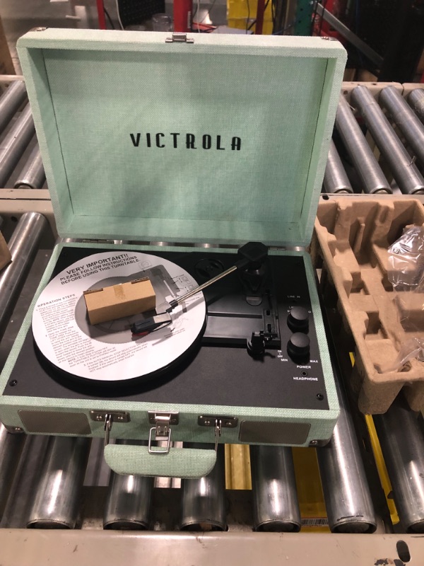 Photo 1 of Victrola Vintage 3-Speed Bluetooth Portable Suitcase Record Player with Built-in Speakers | Upgraded Turntable Audio Sound| Includes Extra Stylus | Light Mint Green Linen