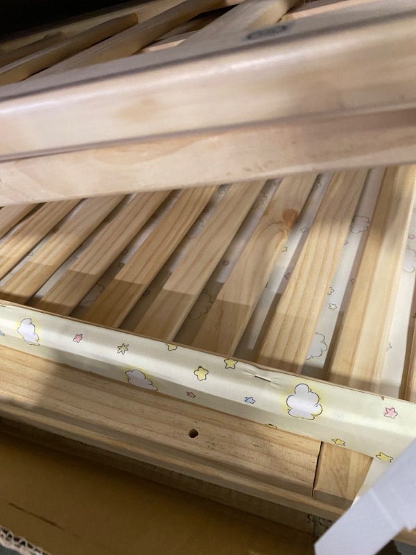 Photo 1 of FUNLIO 4 In 1 Convertible Mini Baby Crib With Changing Table & Wheels, Paint Free Pine Wood Crib For Small Spaces
