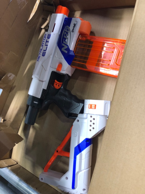 Photo 2 of Nerf N-Strike Elite Retaliator Dart Blaster, Stock, Grip, Barrel, 12-Dart Clip, 12 Elite Darts, Kids Outdoor Toys for 8 Year Old Boys & Girls and Up (Amazon Exclusive) 