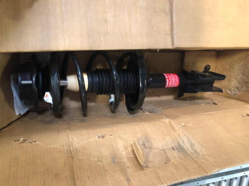 Photo 1 of Monroe Quick-Strut 173111 Suspension Strut and Coil Spring Assembly