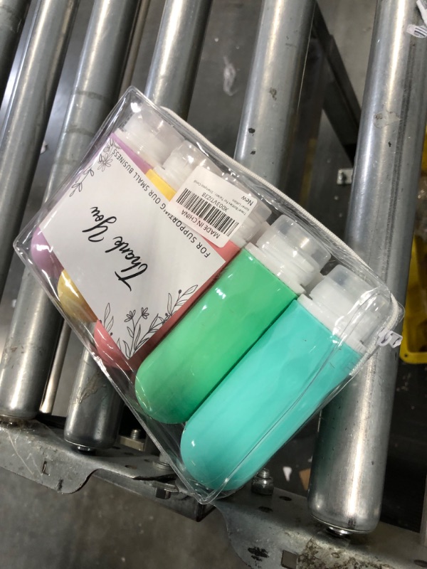Photo 1 of 5 Pieces Travel Bottles for Toiletries, TSA-Approved Convenient 3oz Portable Size, Leak-Proof Design. Made with BPA-Free Squeezable Silicone. Complete Travel Set includes Clear Toiletry Bag?Pink, Blue, Green, Yellow, Purple?