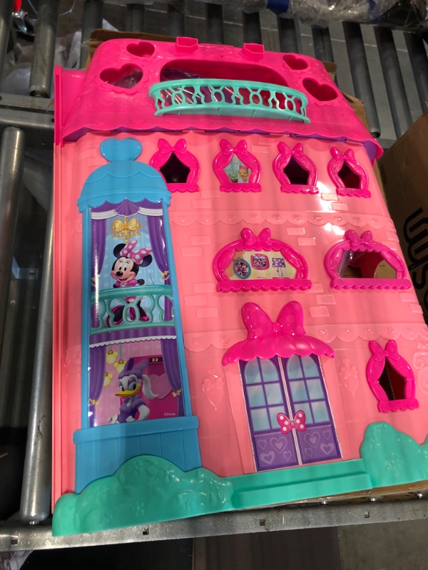 Photo 4 of Minnie Mouse Bow-Tel Hotel, 2-Sided Playset with Lights, Sounds, and Elevator, 20 Pieces, Includes Minnie Mouse, Daisy Duck, and Snowpuff Figures, by Just Play