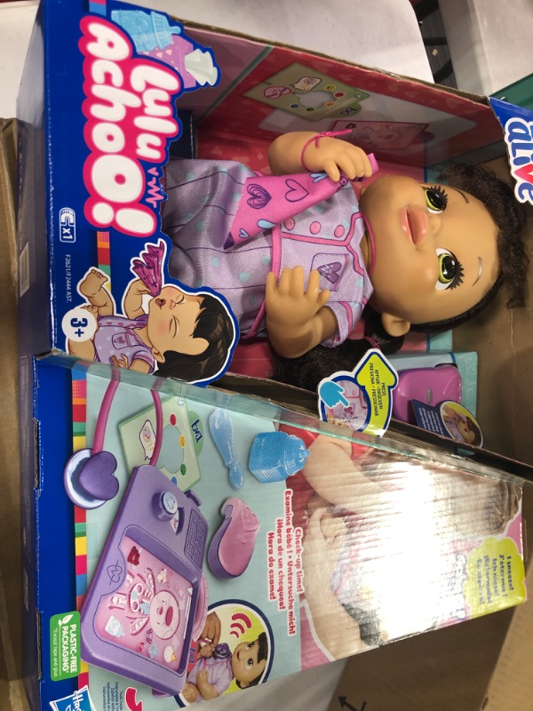 Photo 1 of Baby Alive Lulu Achoo Doll, 12-Inch Interactive Doctor Play Toy with Lights, Sounds, Movements and Tools, Kids 3 and Up, Brown Hair