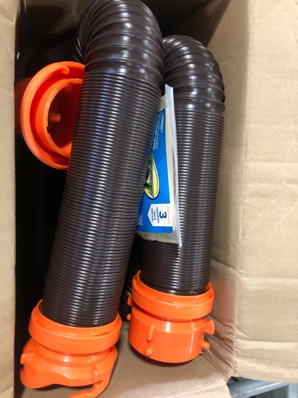 Photo 2 of Camco 20' (39742) RhinoFLEX 20-Foot RV Sewer Hose Kit, Swivel Transparent Elbow with 4-in-1 Dump Station Fitting-Storage Caps Included , Black , Brown 20ft Sewer Hose Kit Frustration-Free Packaging