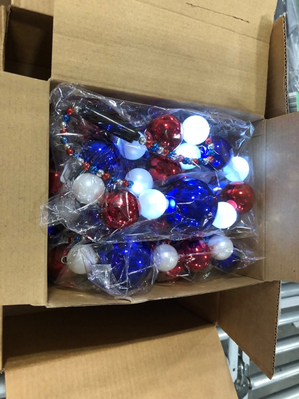 Photo 1 of Karenhi 12 Pcs 4th of July LED Light up Necklaces for Adults Kids Patriotic Light up Necklace Independence Day Beads Necklaces Red Blue White Beaded Necklaces for Memorial Parades Party