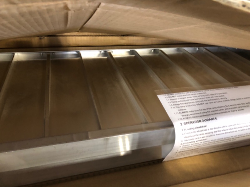 Photo 1 of WHALEMOTOR Portable Wheelchair Ramp 4FT, Anti-Slip Aluminum Folding Portable Ramp, Wheelchair Ramps for Home, Weight Capacity Up to 600 LBS, with Transition Plates Above and Below Portable Non-Slip 4FT