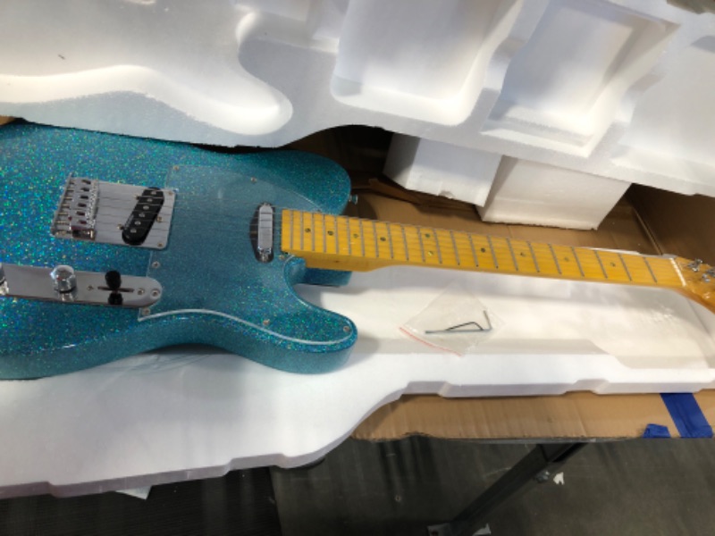 Photo 2 of Leo Jaymz ResonanceX Pro Electric Guitar in Sparkle Color - High Gloss Mahogany Body and Hard Maple Neck - High Transparent Acrylic Pickguard - Highly Output Alnico V Pickups Elite Sparkle Blue