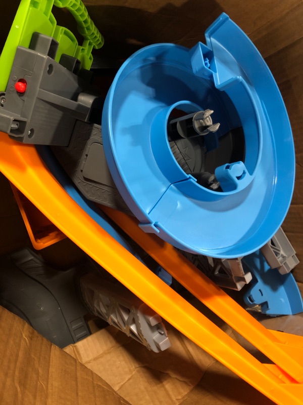 Photo 1 of Hot Wheels Racing Loops Tower by Little People, Toddler Vehicle playset with Spiral Racetrack, Stunt ramp and Sounds