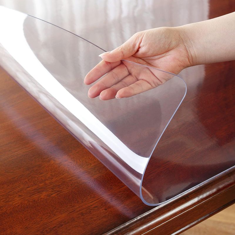 Photo 1 of OstepDecor Clear Table Cover Protector 2mm Thick 48 x 72 Inch Table Protector for Dining Room Table, Dining Table Cover Protector, Plastic Table Cover, Vinyl Table Top Protector for Kitchen Wood Table https://a.co/d/jcXnS7A