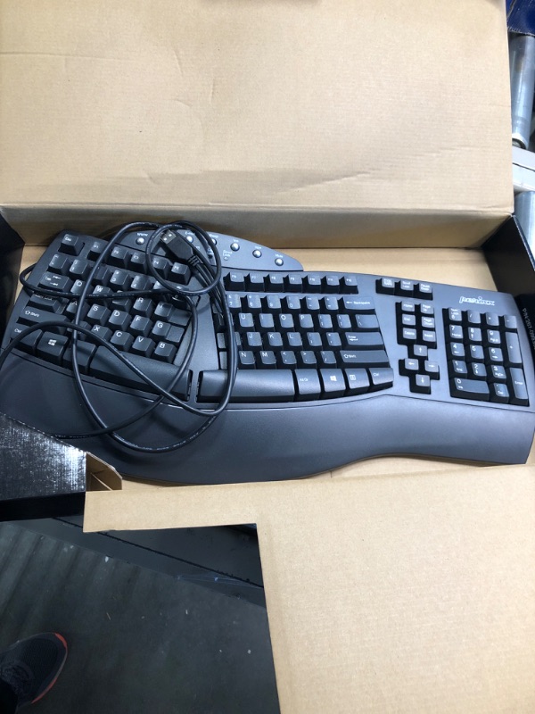 Photo 1 of Perixx Periboard-512 Ergonomic Split Keyboard - Natural Ergonomic Design - Black - Bulky Size 19.09"x9.29"x1.73", US English Layout Wired Black Keyboard