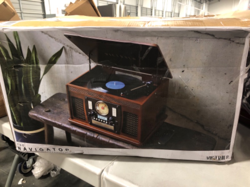 Photo 1 of Victrola Navigator 8-in-1 Classic Bluetooth Record Player with USB Encoding and 3-Speed Turntable Bundle with Victrola Wooden Stand for Wooden Music Centers with Record Holder Shelf, Mahogany